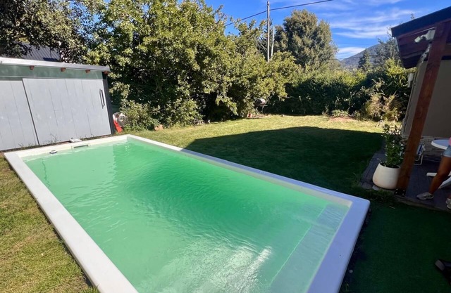 casa con pileta climatizada/mesa de pool y ping pong