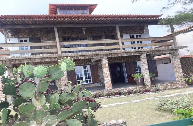 Casa en el paseo marítimo, Arraial do Cabo / Figueira