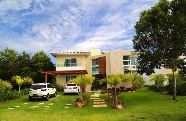 Casa con 4 suites en condominio de lujo cerca de la playa