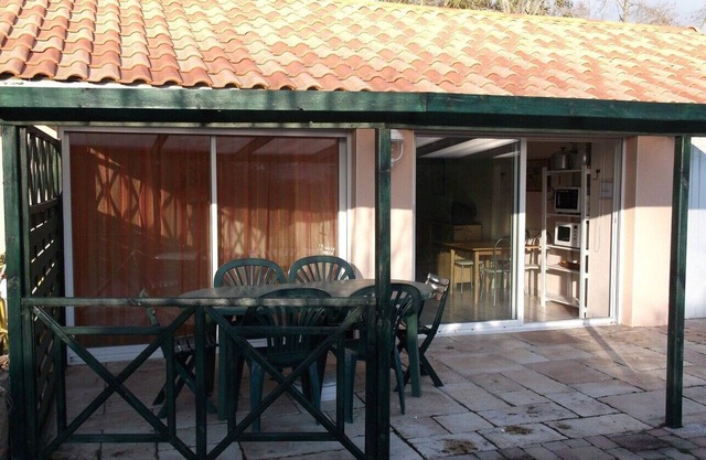Casa con terraza cubierta