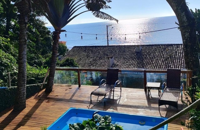 House with pool facing the sea
