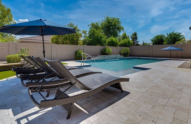 Huge pool, patio, clean 4 bdrm close to sports, hiking, spring training, golf
