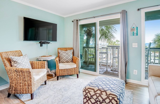 Ideal Coastal Condo W/ Water Views, Private Balcony, Fast WiFi & Shared Pool!