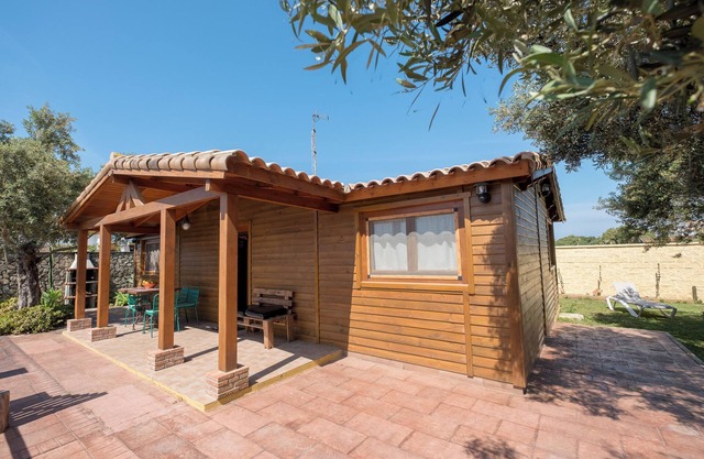 Ideal para deportistas y cerca de la playa - Casa de madera Naranjo con piscina compartida