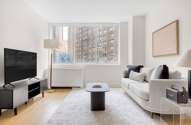 Ideal Midtown East 2BR w/ Elevator, Doorman & Gym, near UN, by Blueground