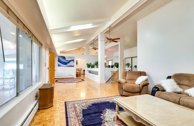 Ideally located home overlooking mountain & golf views - two primary bedrooms