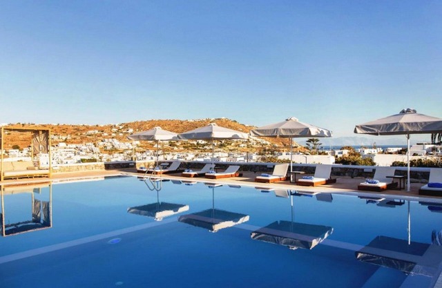 Incredible Mykonos Apartment | Apartment Revchi | 2 Bedrooms | Family Garden View Suite | Spacious Shared Swimming Pool Surrounded with Furnished Sun Terrace | Korfos, Ornos