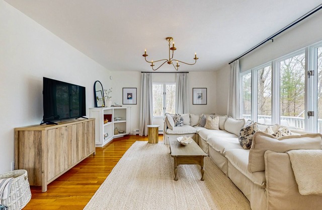 Inviting Home Near the Ocean with a Deck, and Outdoor Fire Pit