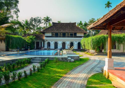 Kumarakom Tharavadu - A Heritage Hotel, Kumarakom By Perfect Stays