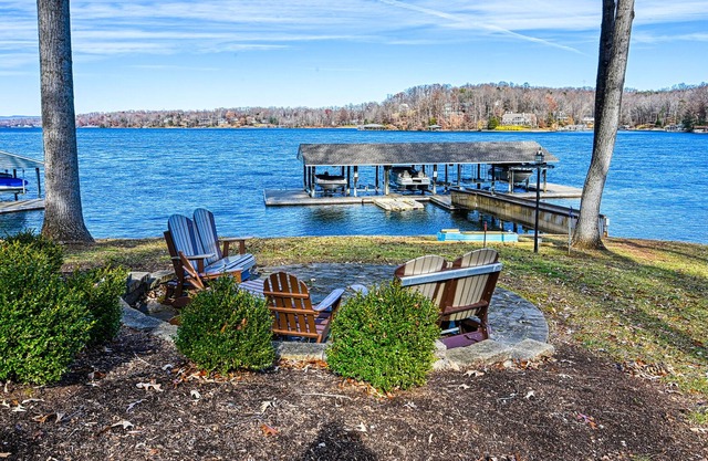 Lakefront, dog-friendly townhome with dock, boat slip, sunrise views & decks