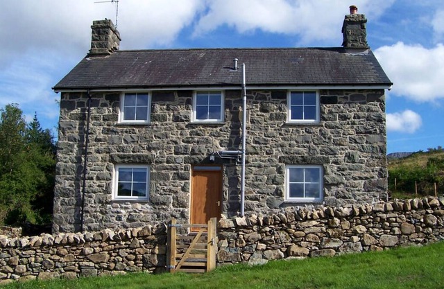 Ubicada en la montaña Cadair Idris, esta atractiva casa de campo ofrece excelentes vistas y una