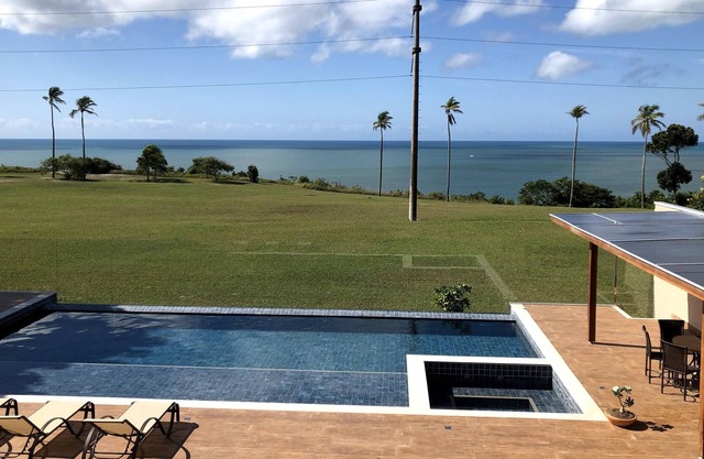 Luxurious house with pool and sea view in a private condominium