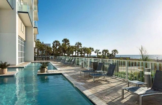 Luxury 2BR Condo at Ocean 22 | Stunning Views, Pools & Direct Beach Access