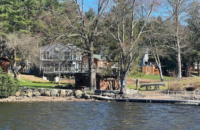 Luxury lakeside retreat with hot tub and entertainment for the ultimate getaway!