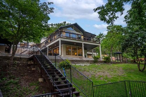 Luxury Riverfront Villa with Firepit & Gameroom!