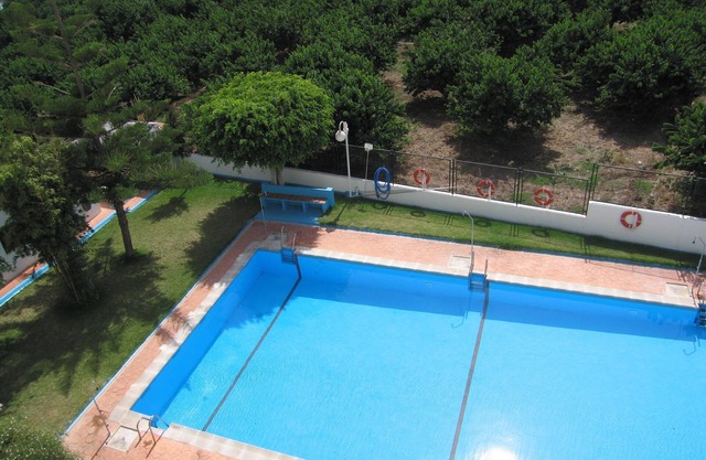 Magnífico apartamento con piscinas, terraza y vistas al mar y la Vega, Wifi-Sate