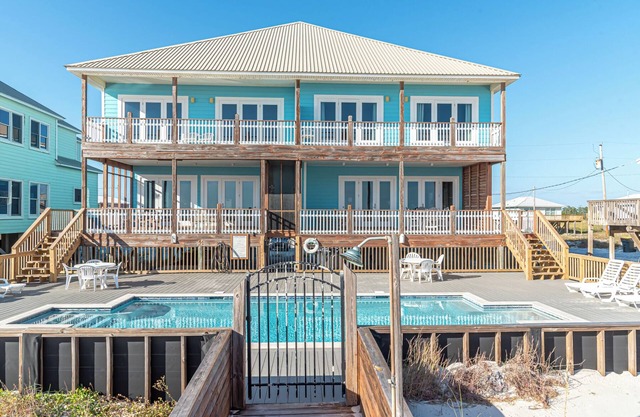 Margarittaville West. Professionally decorated, Gulf front, 6 BR 4 BA.