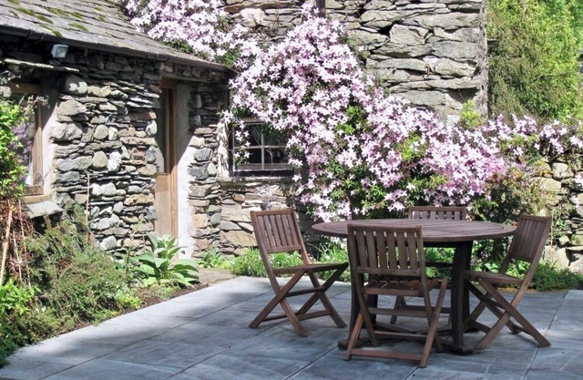 HARTSOP MILL COTTAGE, a cosy bijou hide-away surrounded by mountains