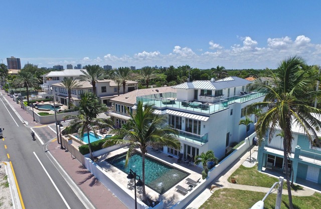 Modern 7,000 SF Beachfront Estate w/ Roof Deck