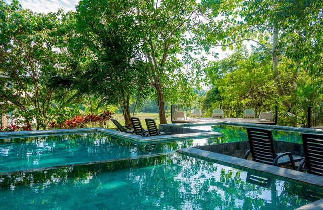 Modern condo with on-site pool, WiFi, and centrally located