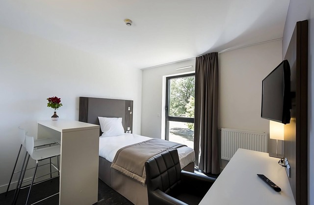 Modern Mini-Apartment with Kitchen Amenities & Peaceful Surroundings