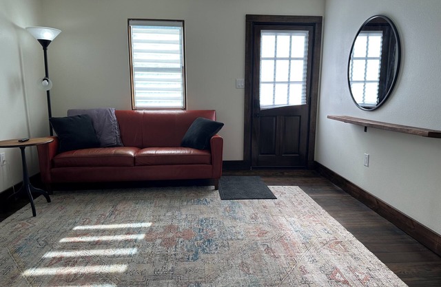 Modern stone cottage just one minute from I-40 exit 321 in Muldrow, Oklahoma.