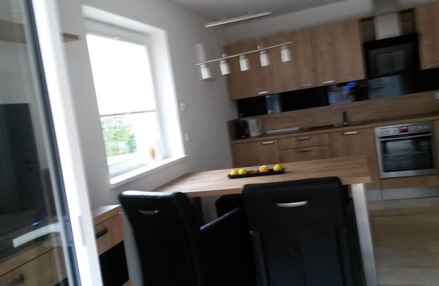 Moderno apartamento nuevo en el Kurpark con TG y terraza.
