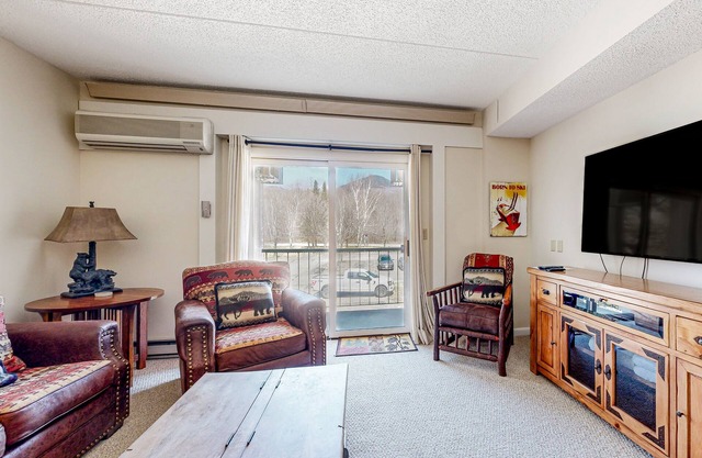 Mountain & river view condo w/ pool, hot tub, game room & walk to ski lift