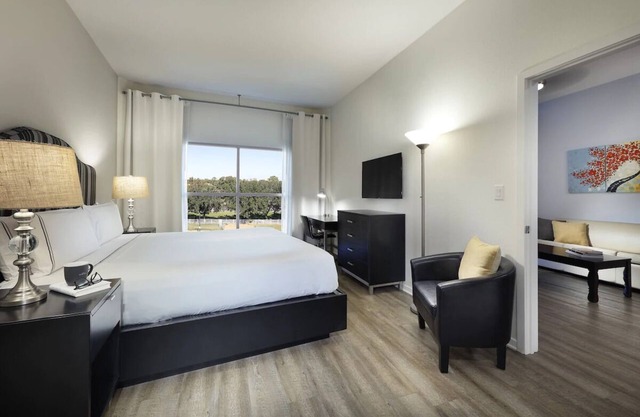 Near Disney! Upscale Orlando Suite w/ Kitchen + Pool + Orlando Parks Shuttle