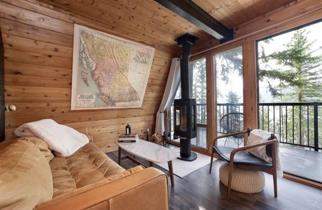 New** Bayside Estate: A quaint and cozy A-frame cabin nestled among the trees.