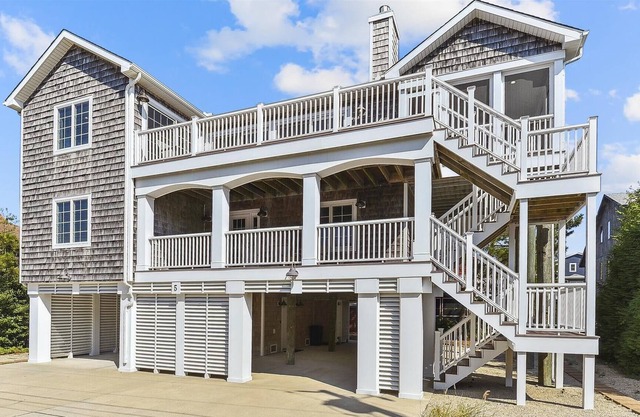 NEW LISTING 2024! Exceptional custom vacation home located just steps from the beach front in beautiful family friendly South Bethany!