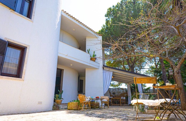 New villa with garden a few meters from the sea in Porto Cesareo