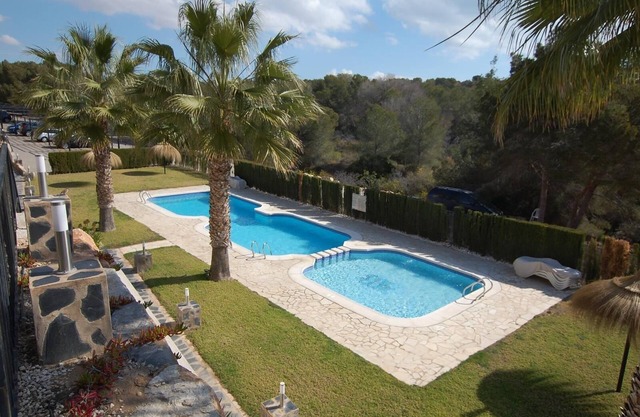 Bonito apartamento en una zona maravillosa con piscina compartida y Wi-Fi