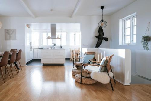 Ocean Views and Gorgeous Design in a Light-Filled 3 BDRM/1.5 Bath Village Home