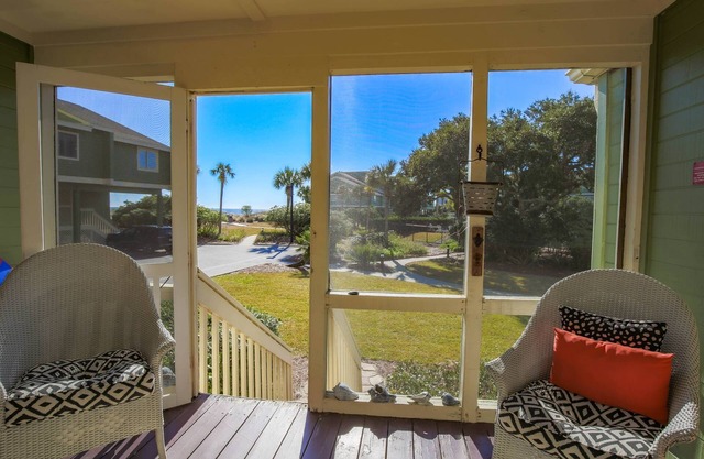 Ocean Views! Wonderful Screened Porch w/ Exterior Door to Access the Community Pool or Wide Beach