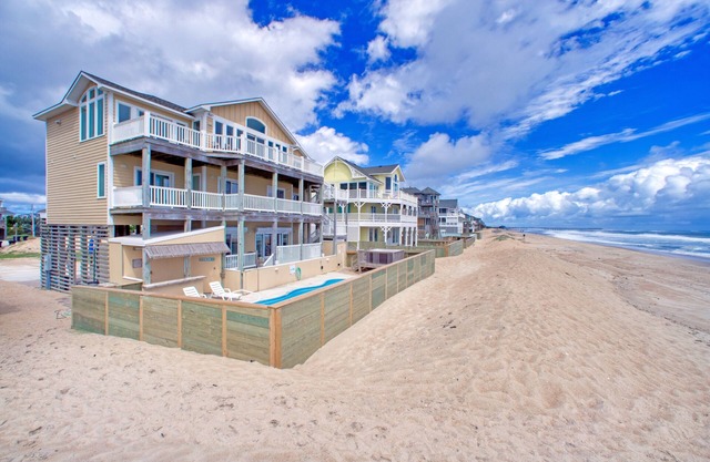 Oceanfront home with ocean view, private hot tub, outdoor pool, & central AC