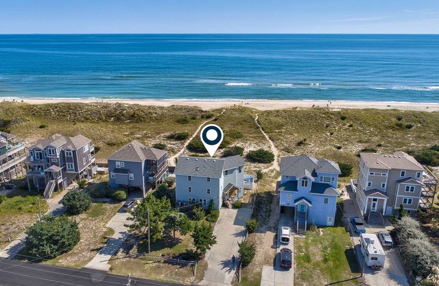 Oceanfront home with private hot tub, outdoor pool, fireplace, & game room
