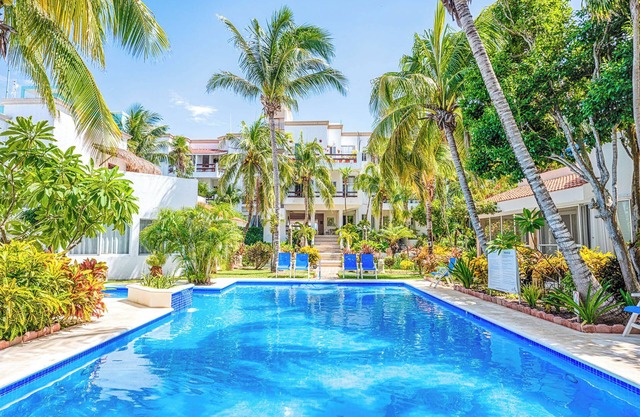 Oceanfront Living with Direct Beach Access and Lush Poolside Gardens!