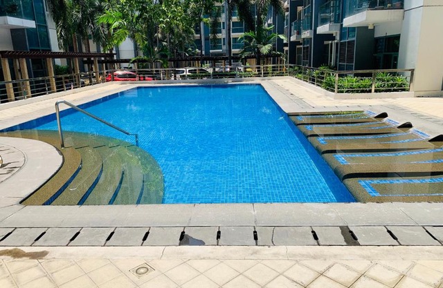 One Palm Tree Villas Condominium - Studio 5M with Balcony - Across Terminal 3 Airport