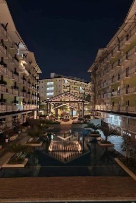 OVERTIME STAYCATION - Nearest to Airport with FREE POOL & GYM ACCESS