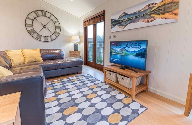 Pass the Keys | Lovely Lakeland lodge with private parking