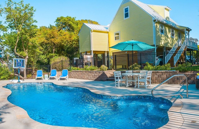 Peaceful 4BR Beach Escape w/ Famous Heated Mystery Pool™ | 2-min Walk to Beach