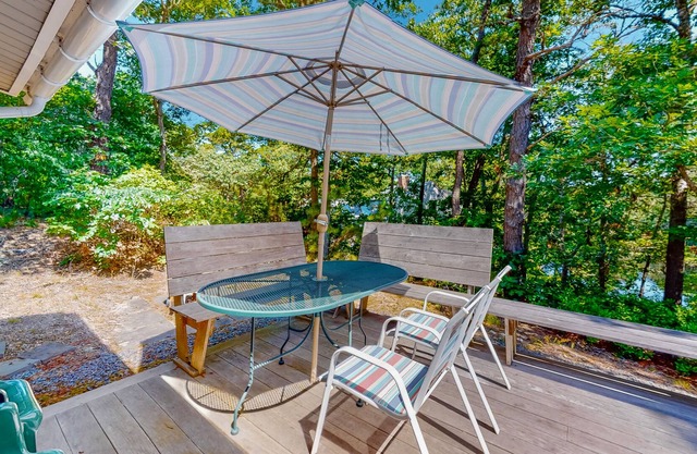 Peaceful woodland home with spacious property, pond views, & outdoor dining