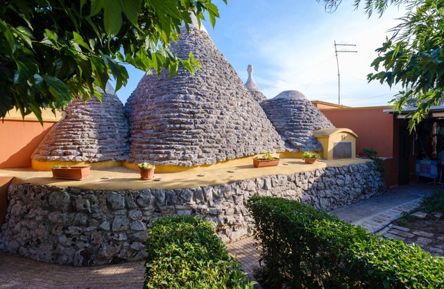 Villa Trullo con jardín y barbacoa; mascotas permitidas