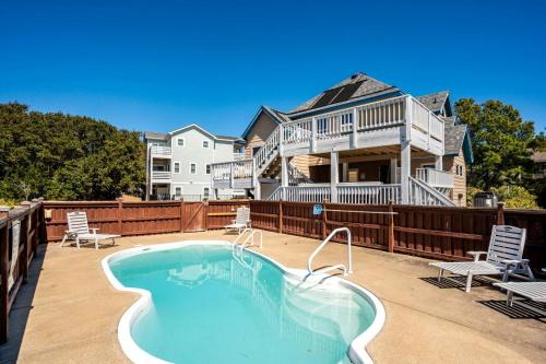 Pet Friendly Coastal Cottage in Corolla, North Carolina, Complete with Outdoor Pool and Private Hot Tub