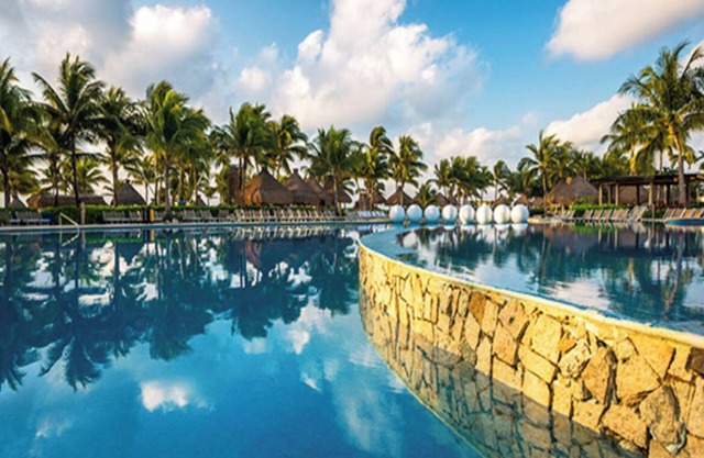 Polished hotel in a beachfront resort complex with a restaurant and outdoor pool