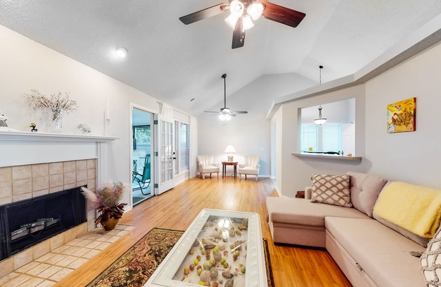Quiet home with dog-friendly yard, fireplace & screened patio - 30-night min.