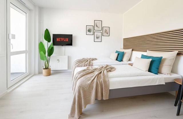 Quiet & modern 2-room apartment for 4 people opposite the park