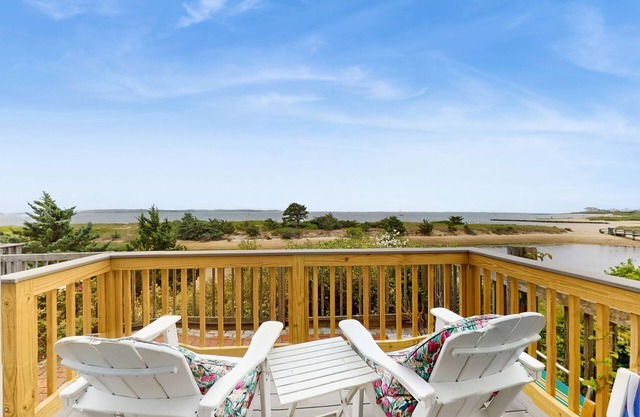Quintessential coastal studio with beach access, BBQ area, patio, & water views