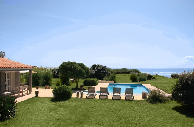 Refinada y confortable, esta magnífica casa contemporánea, orientada sud